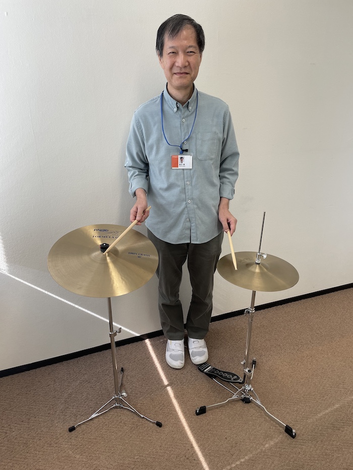 Atsushi Hoshiai plays cymbals